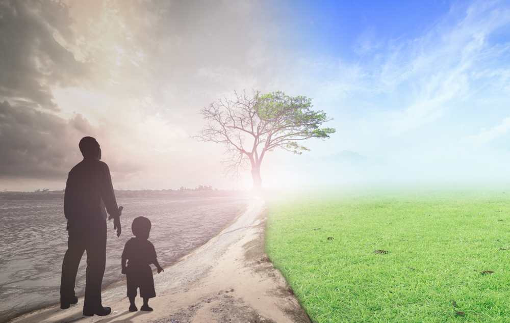 World environment day concept: Father and child standing between climate worsened with good atmosphere